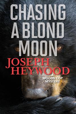 Chasing a Blond Moon: A Woods Cop Mystery